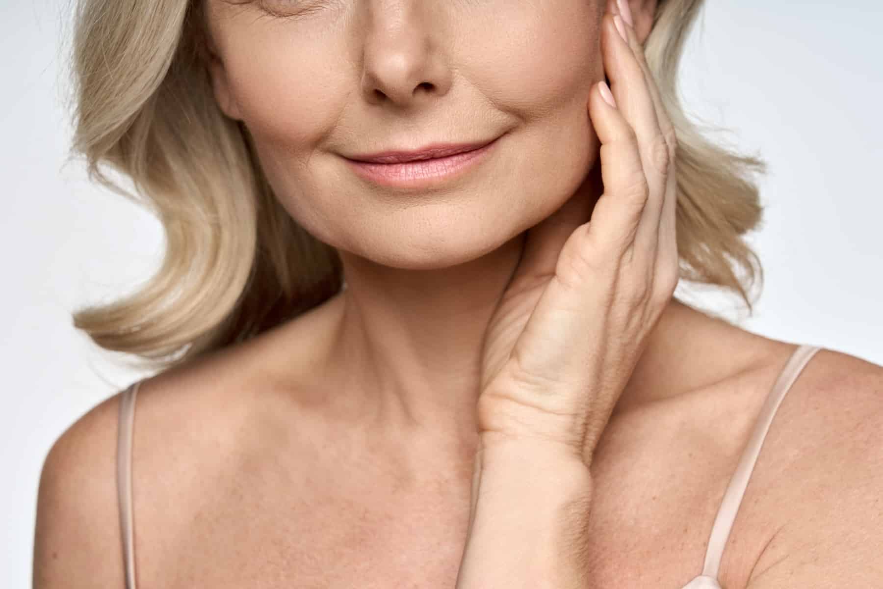 beautiful mature woman with aged neck